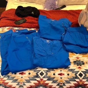 Royal blue set of healing hands scrubs